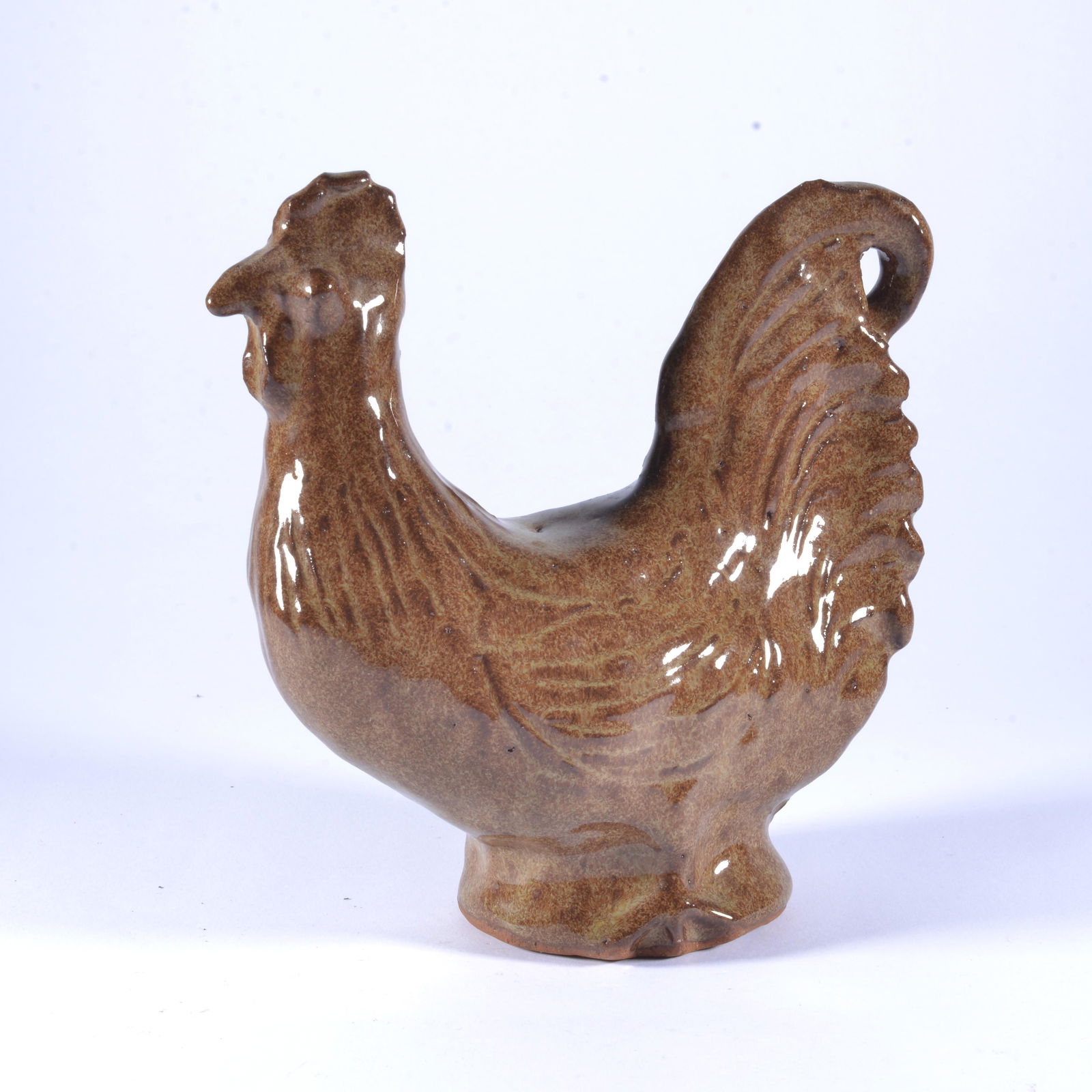 Charles Moore Sitting/Roosting Rooster Figural Jugtown Folk Pottery: Similar to lot #153, this has rooster has a unique green speckled glaze. TRIPLE stamped Jugtown, including once on the actual rooster body (highly uncommon). Signed by Charles on base w/ 811 or 118 on