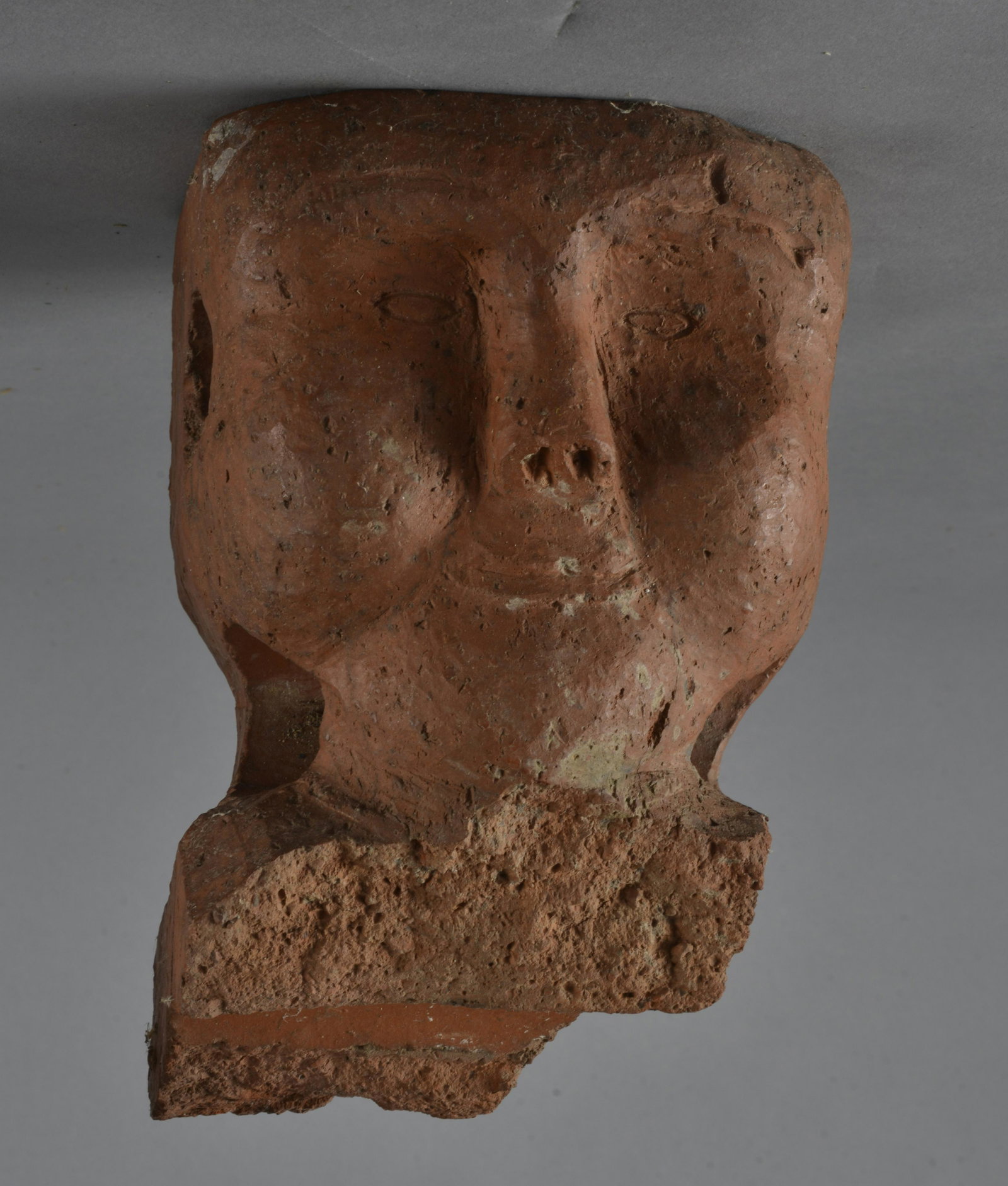 Sewer Tile Pottery Folk Art Face 19th Century: Very simple addition made as part of another brick with the small details to create a fairly abstract face. Neat and unique piece, possibly 19th century. Obviously made a brick factory, 19th century- 