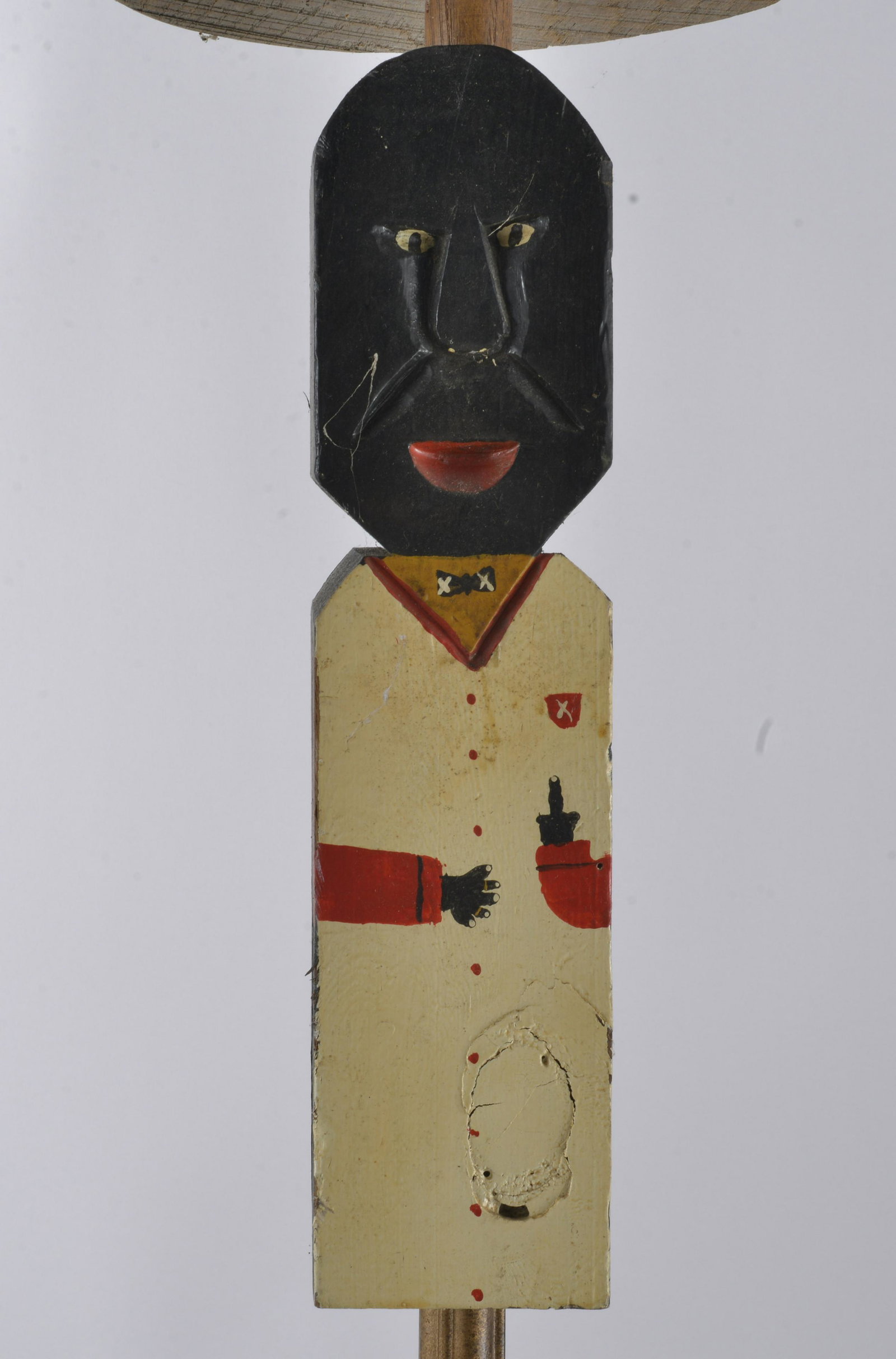 Benny Carter Folk Art: carved wooden figure of black man. Paint and wood- 12"