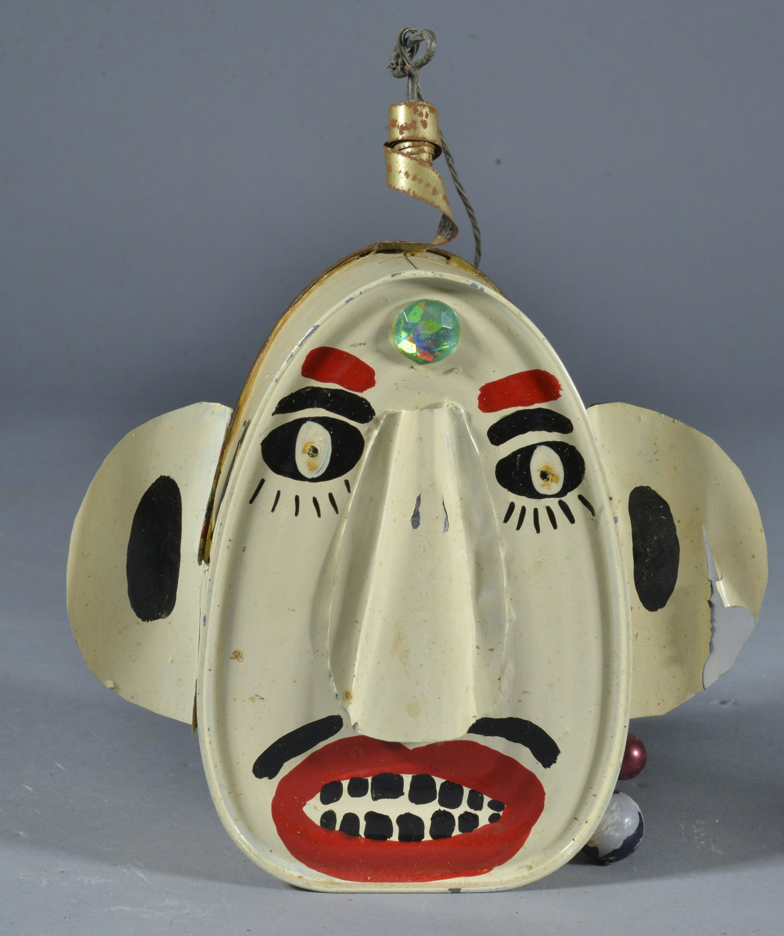 Benny Carter Folk Art: small painted sardine can, face jug style- Height 6" to top of can