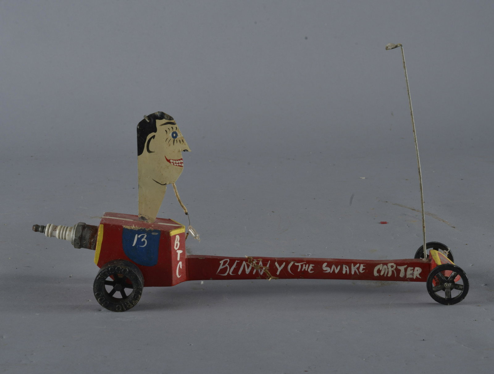 Benny Carter Folk Art: very rare toy car made and painted by Benny - around 10 of these were made and very few have come on the market for sale since his death in 2014. this one has been broken. - Length 14" Height to top o