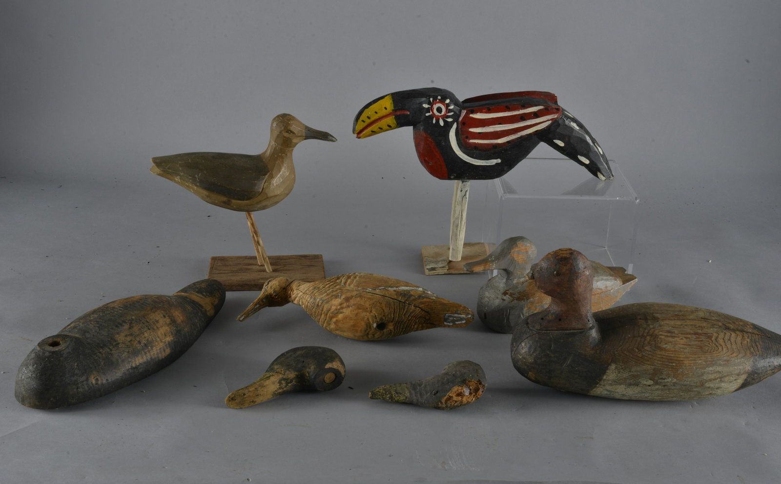 Antique Duck Decoy Group: wood and paint, this group has damage and losses.- Largest bird is 11" x 16"