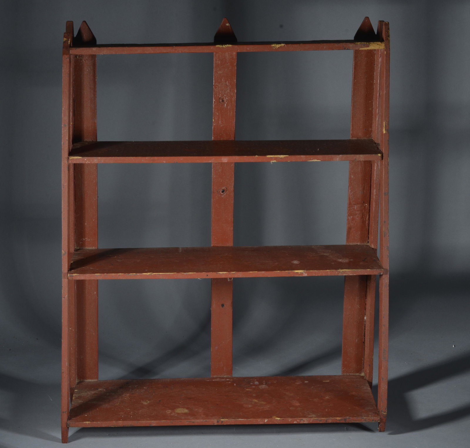 Painted Red What not shelf: wood and paint, nice shelf, some loss to top right edges of shelf- Height 24" Length 19" Depth of bottom shelf 6 1/2" Depth of top shelf 3"