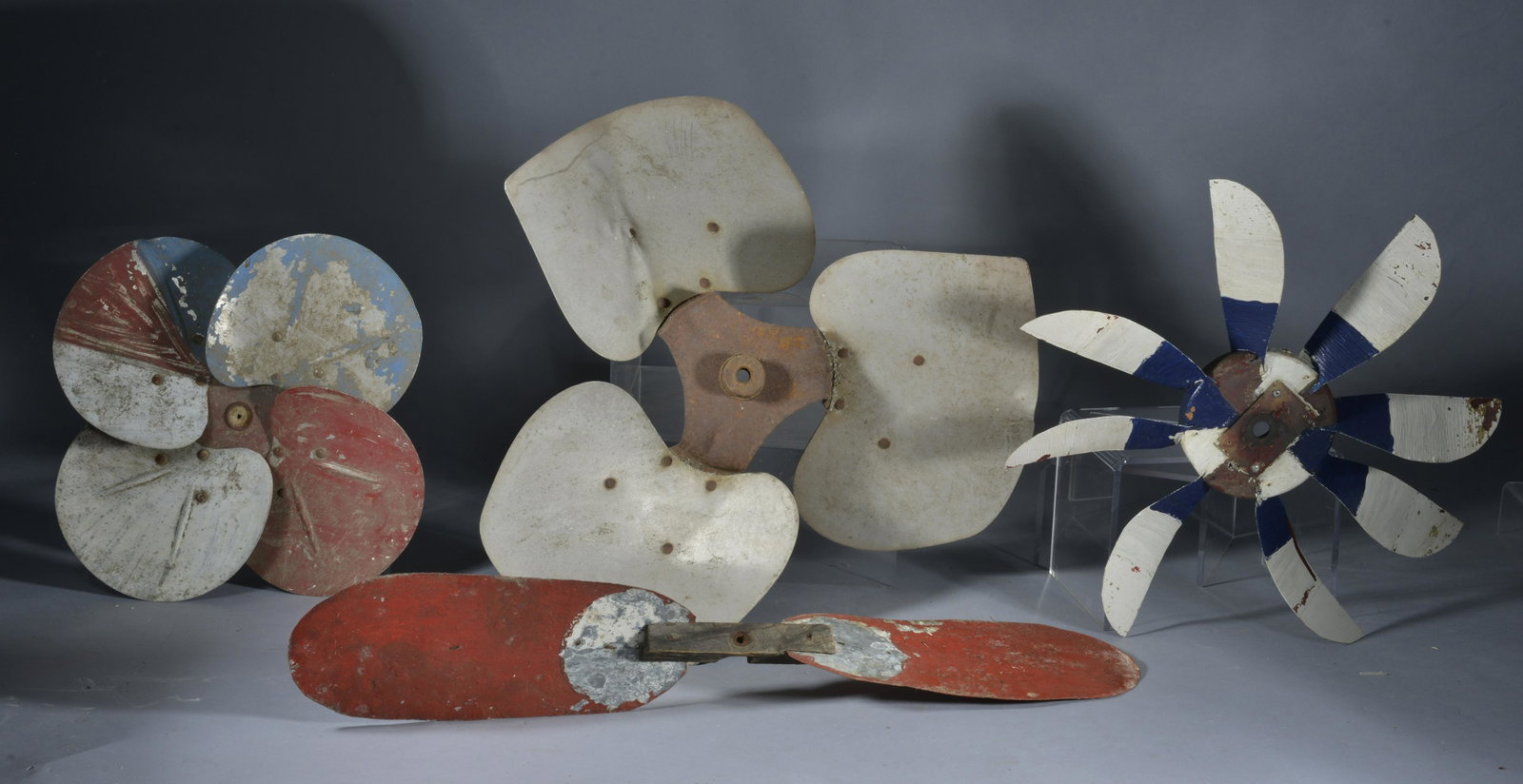 Group of Whirligig Paddles: some tin, some wood, all have wear and loss- largest is 26" long