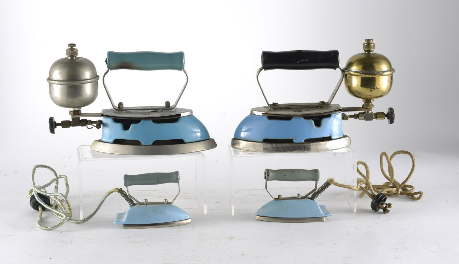 Five Piece Assosrted Light Blue Coleman Cast Iron  Irons (1 of 4)