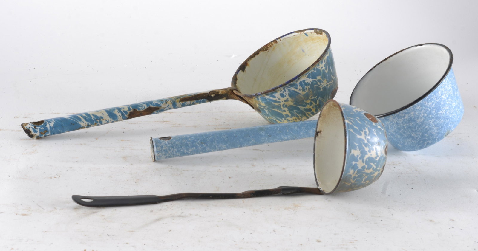 Three Assorted Light Blue and White Enamelware Dippers: All Original Condition, Some Rust on Metal. Overall Good Condition