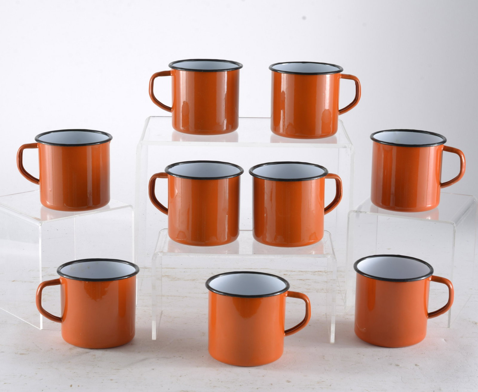 9 Piece Orange & Black Enamelware Coffee Mugs: All Original Condition, Some Rust on Metal. Overall Good Condition