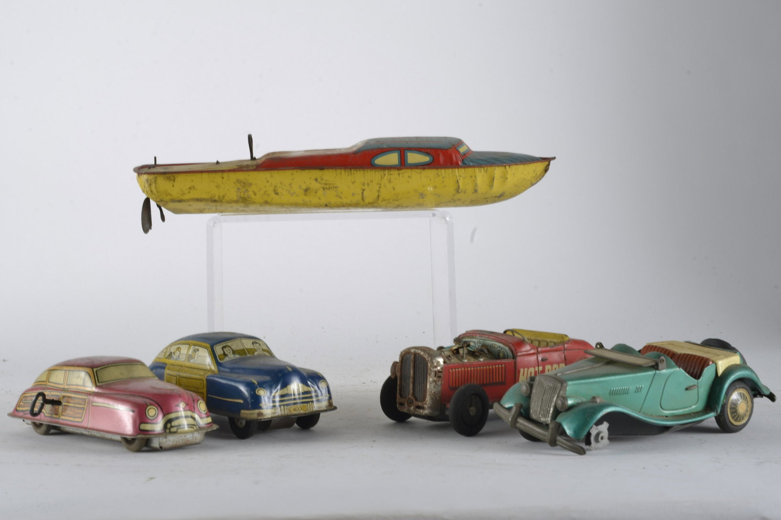 5 Litho Toys -Lindstom speedboat and 4 cars: see photos - wind up and friction -Boat 14" L