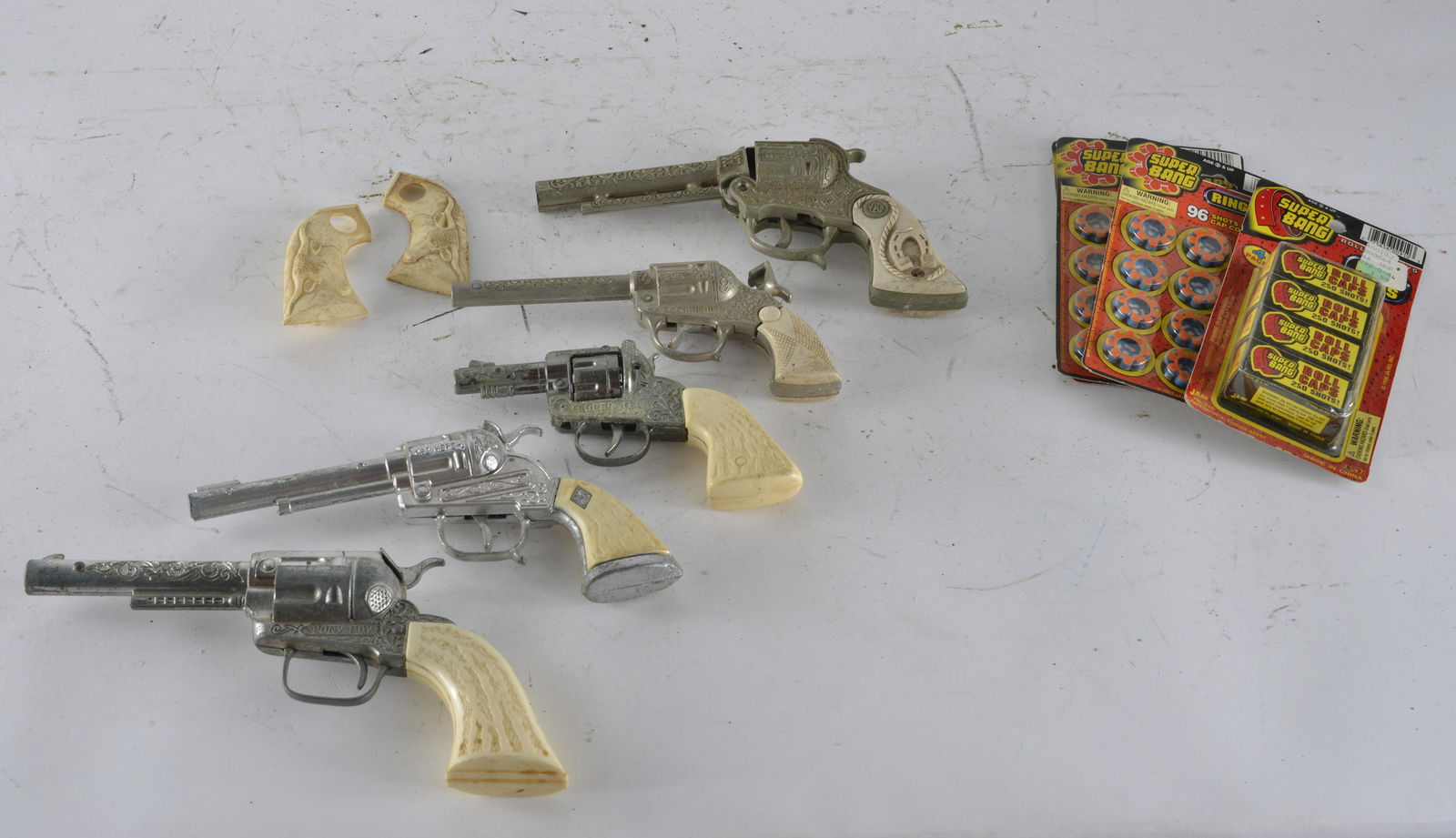5 assorted Cap Guns with caps (1 of 2)