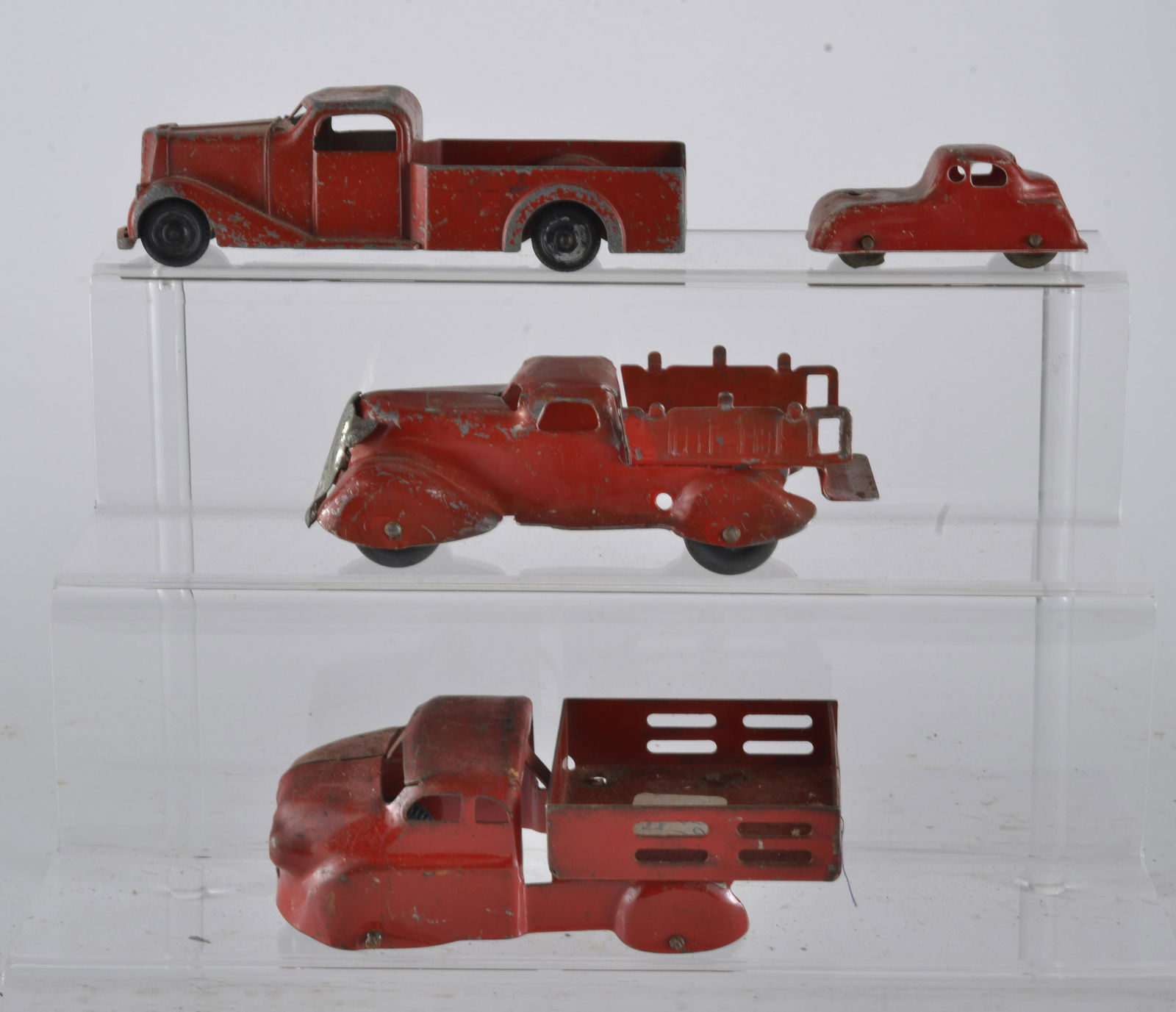 4 assorted metal trucks and car (1 of 2)