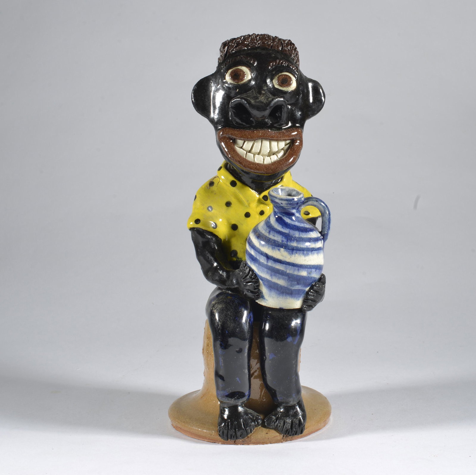 Albert Hodge Black Man Figural Catawba Valley NC Pottery: Albert Hodge, now retired, created folk pots of in the middle of the Catawba Valley on NC 10 in Vale, NC, just down the street from Kim Ellington & Charlie Lisk. Initially for the first few years he w