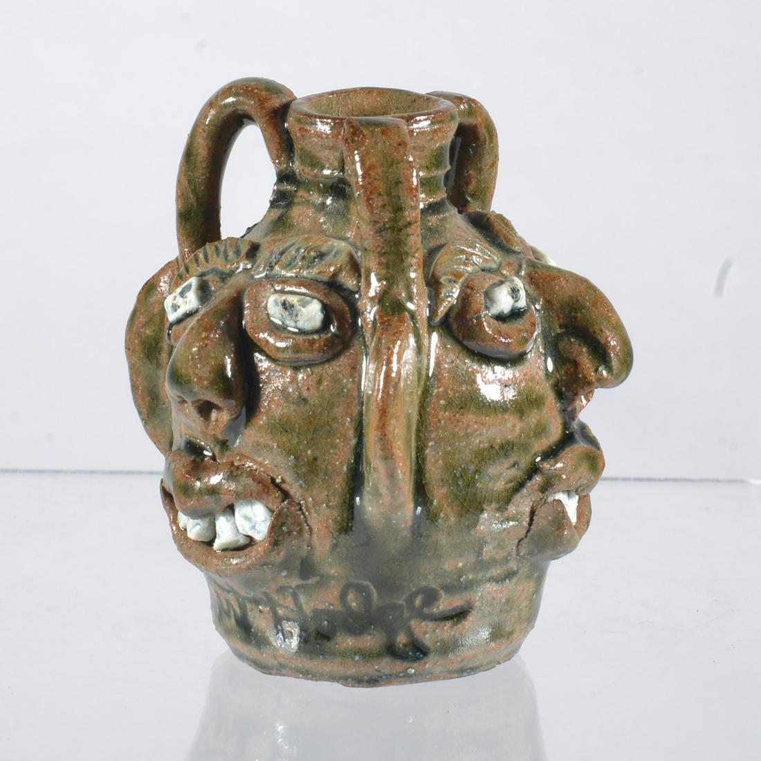 Albert Hodge Miniature MINI TRIPLE Face Jug Pottery Catawba Valley NC: This is basically a matching pair to Lot #31. A very rare Albert Hodge miniature triple face jug with each of the faces being unique, including one devil. Mini triple face jugs by folk potters are ver