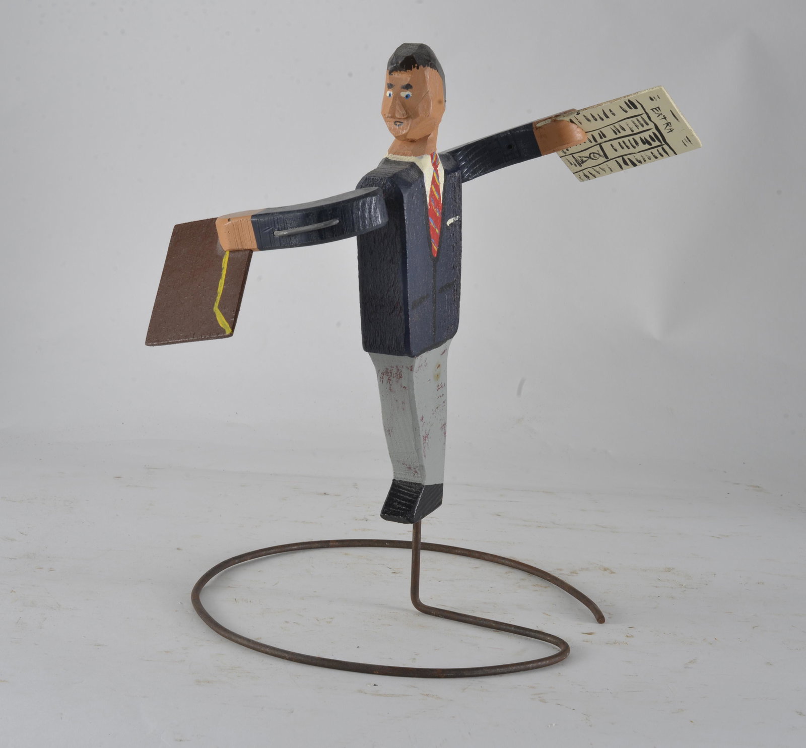Folk Art Whirligig: wood and paint mounted to wire base. Signed on back leg 13"H
