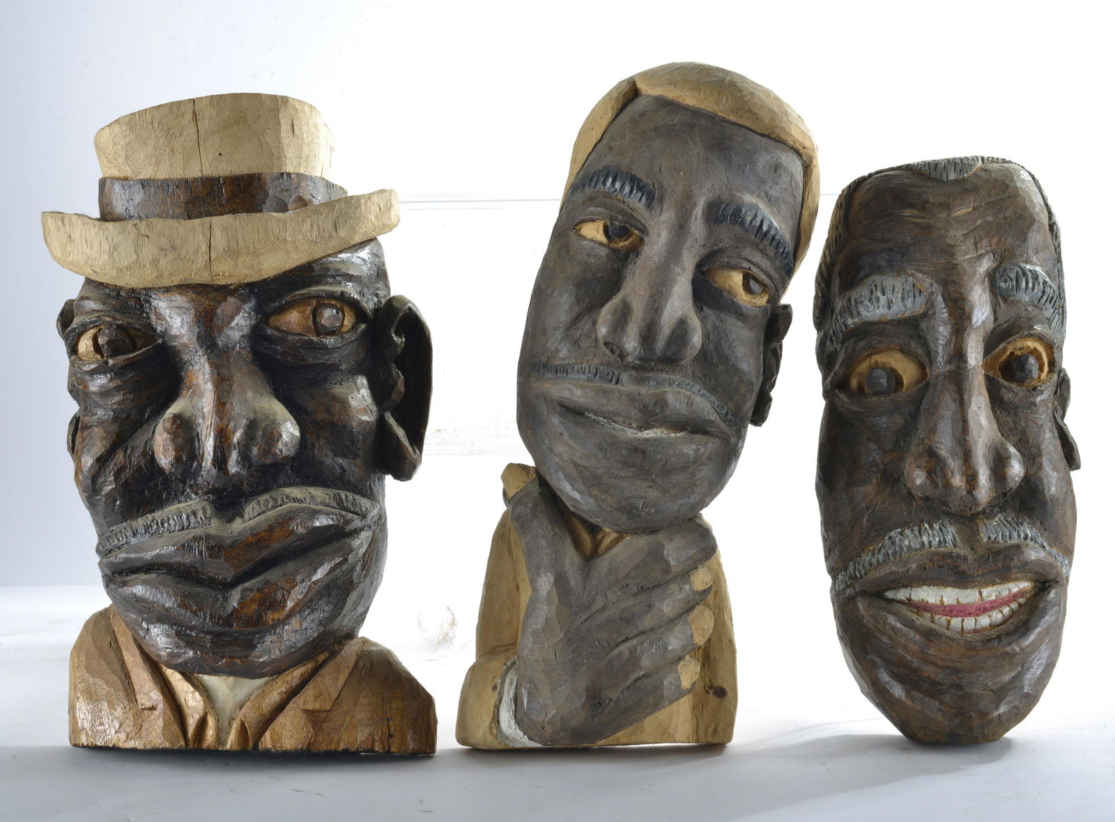 Roy Butcher Carved Head Group (3) (1 of 2)