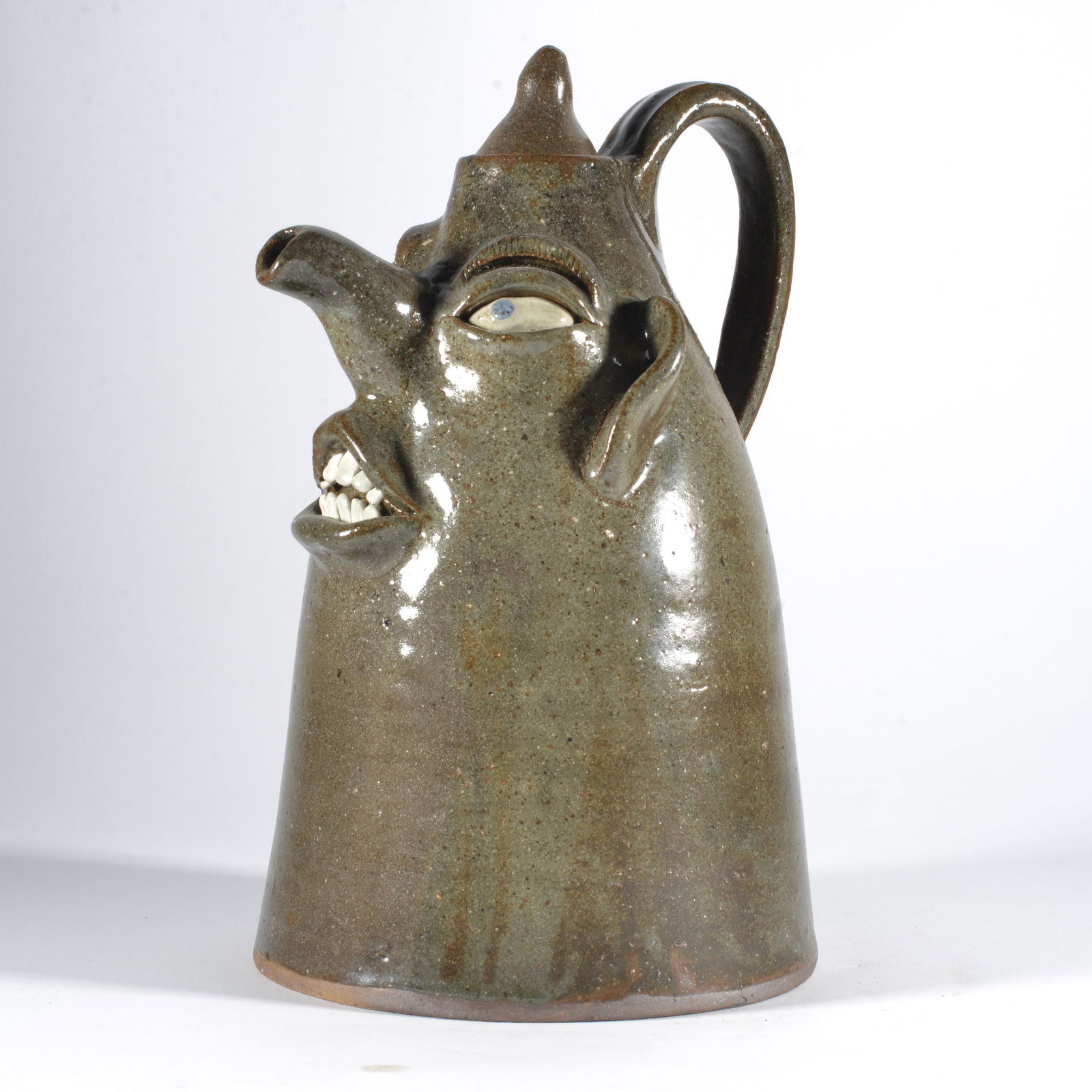 Joe Reinhardt Tankered Pitcher Face Jug: signed on bottom, dated 1994.