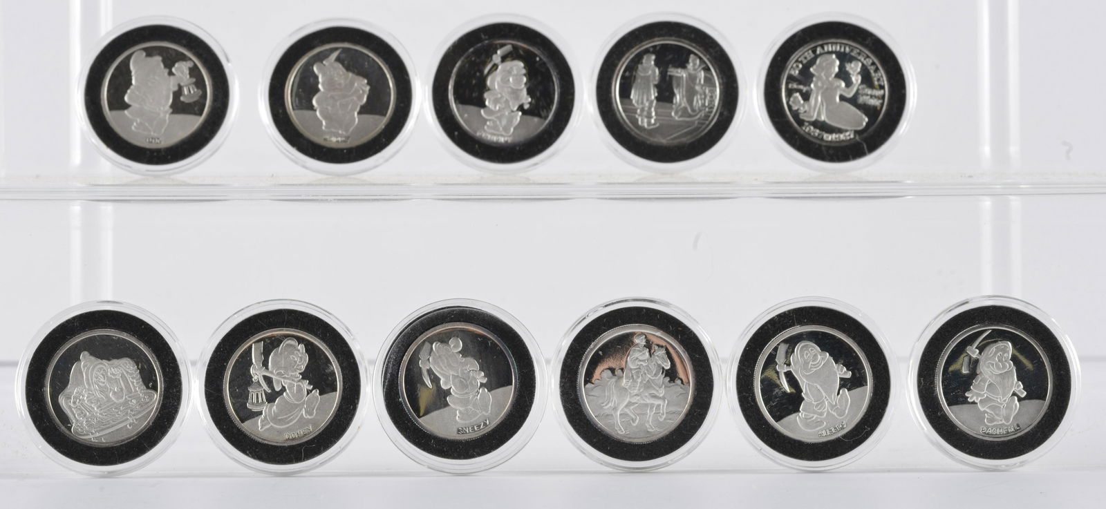 11x half oz silver coins. walt disney snow white: 11 coins each .5 ounces of silver. estate coins