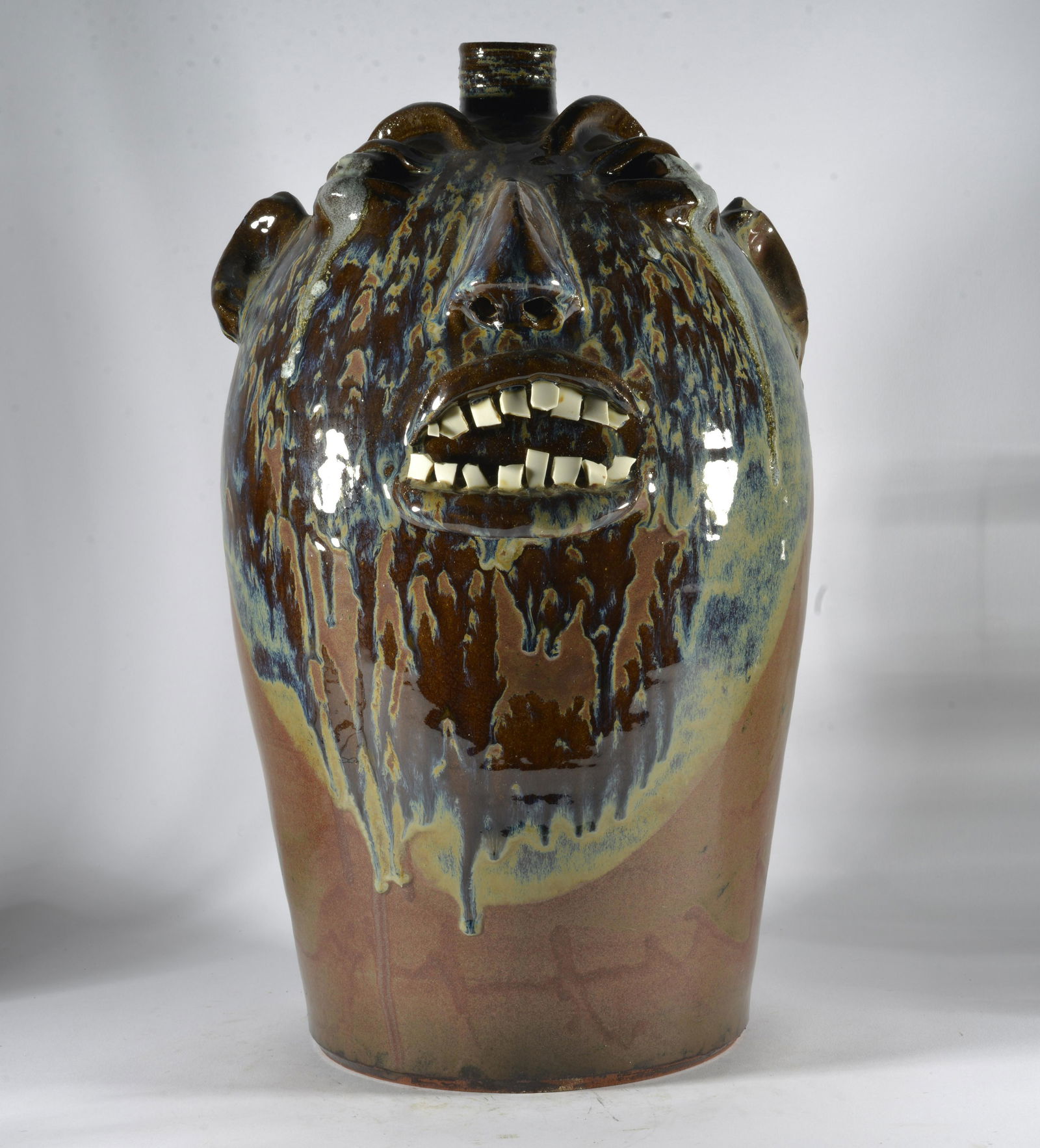 Marvin Bailey Folk Pottery Large Face Jug: 17.5" 4 or 5 gallon face jug, this is the biggest face jug Marvin produces and this size is rare. Double row of broken china teeth. . by South Carolina potter Marvin Bailey, of Lancaster, SC. Born 196