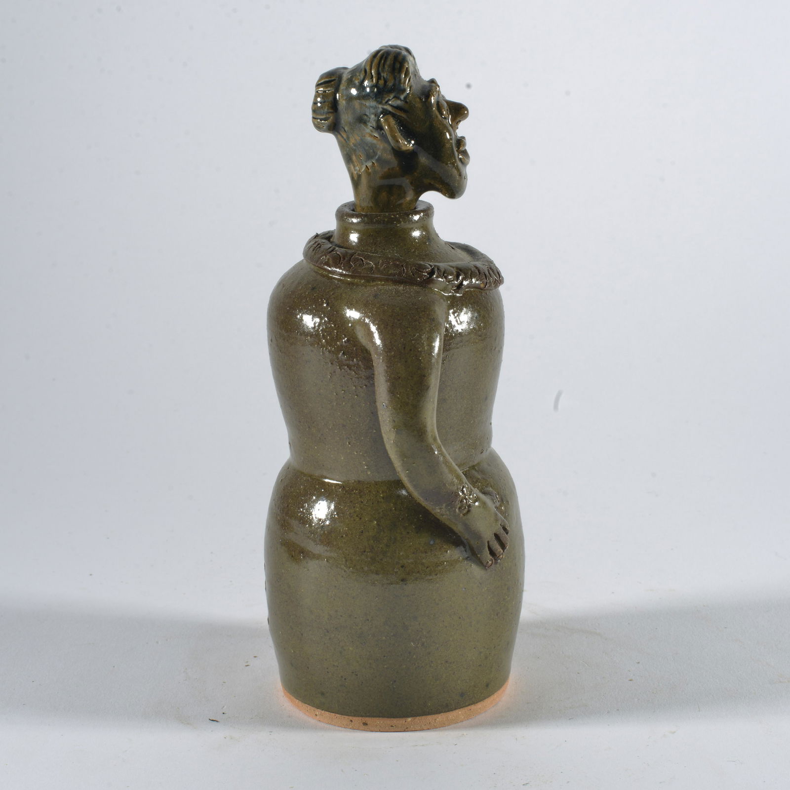 Kathy Richard Figural Face Bottle: 7" signed on bottom.