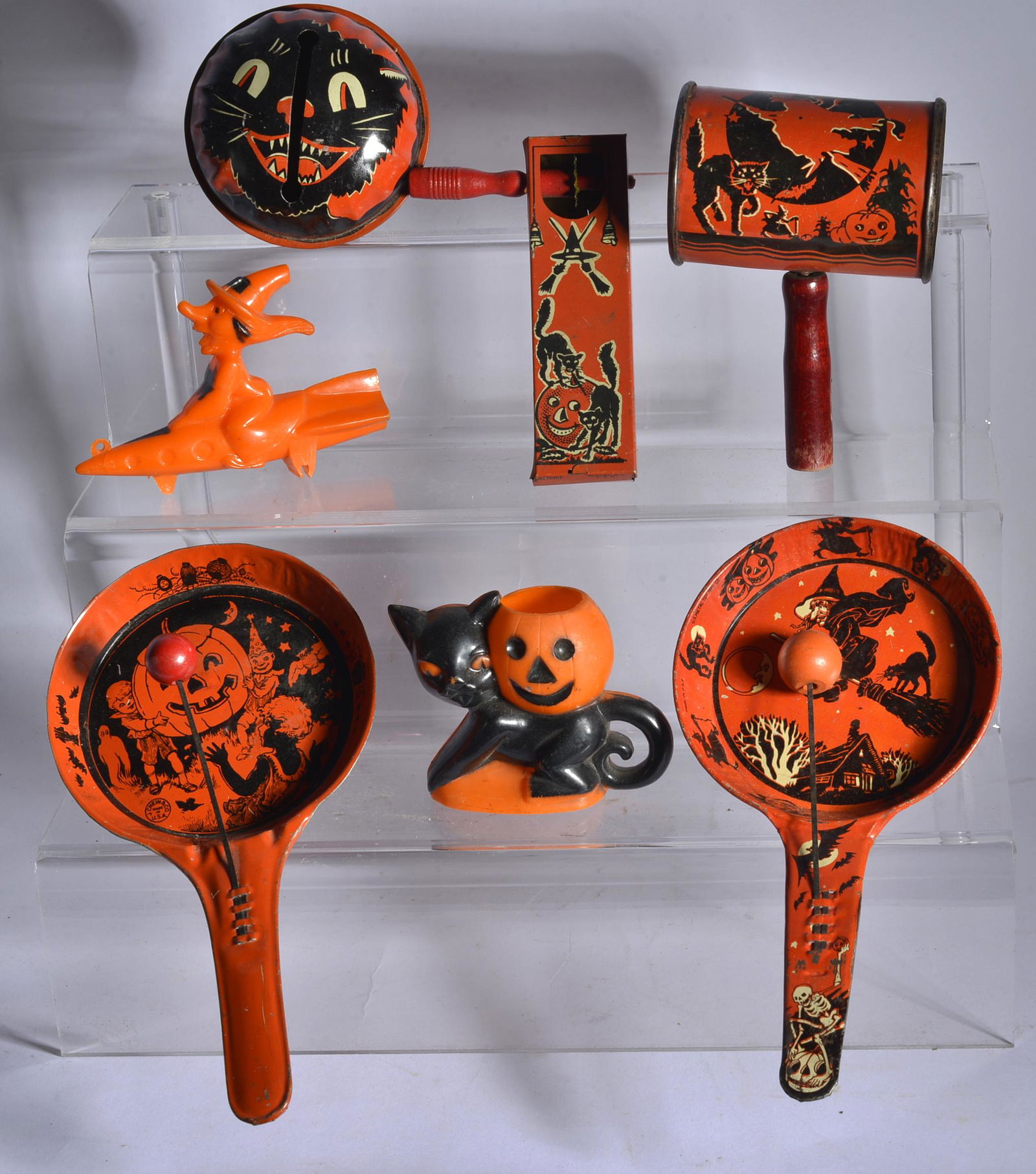 HALLOWEEN TIN LITHO & PLASTIC NOISY MAKERS: PLASTIC WITCH RIDING S ROCKET, PLASTIC TOOTH PICK HOLDER, TIN LITHO NOISY MAKERS, ETC. ALL HALLOWEEN THEMED.