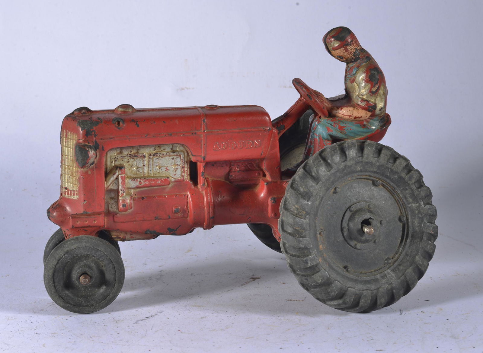 RED RUBBER AUBURN FARM TRACTOR (1 of 3)