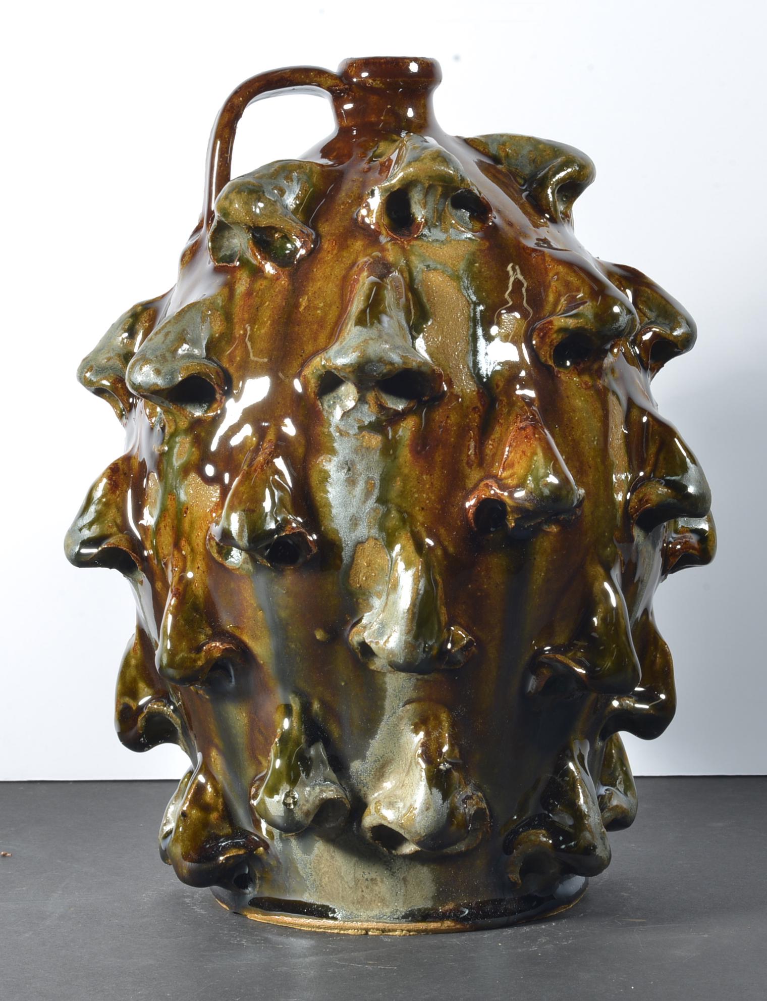 Marvin Bailey Nose Jug: 11", very rare, the only one we have ever seen. Great alkiline glaze. Signed on bottom