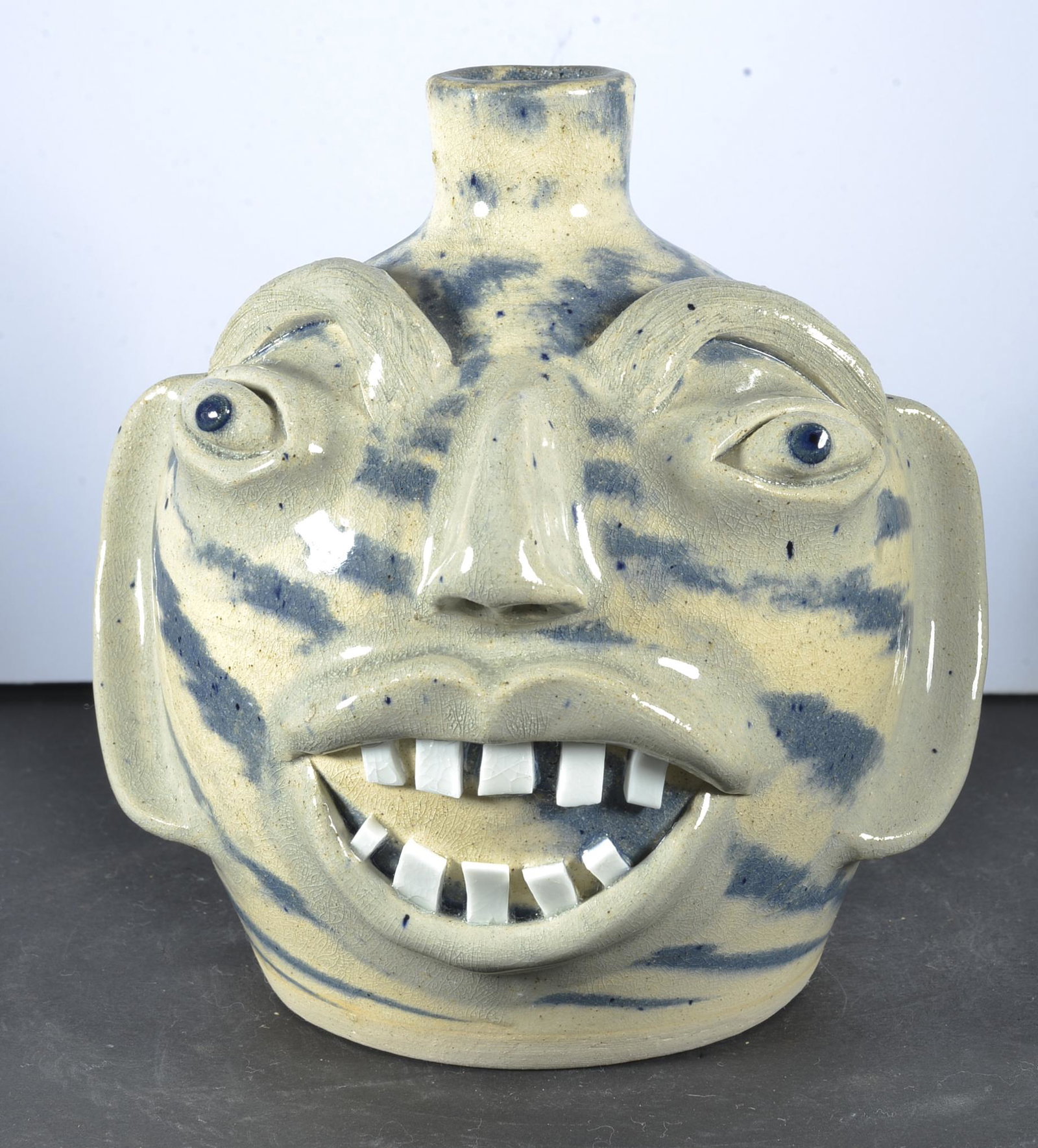 DALE COSTNER SWIRL FACE JUG: DOUBLE ROW TEETH 6.5 ' TALL