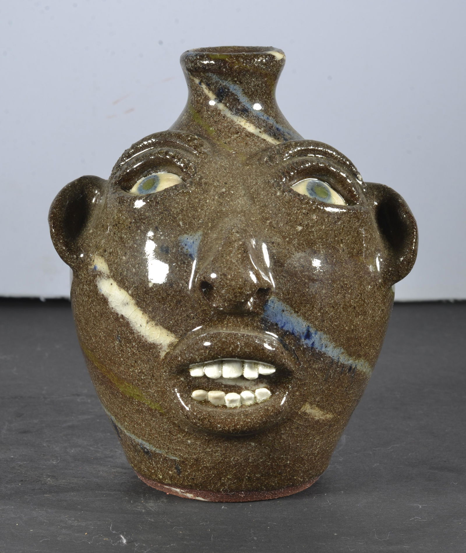 JOE REINHARDT MINIATURE SWIRL FACE JUG (1 of 5)