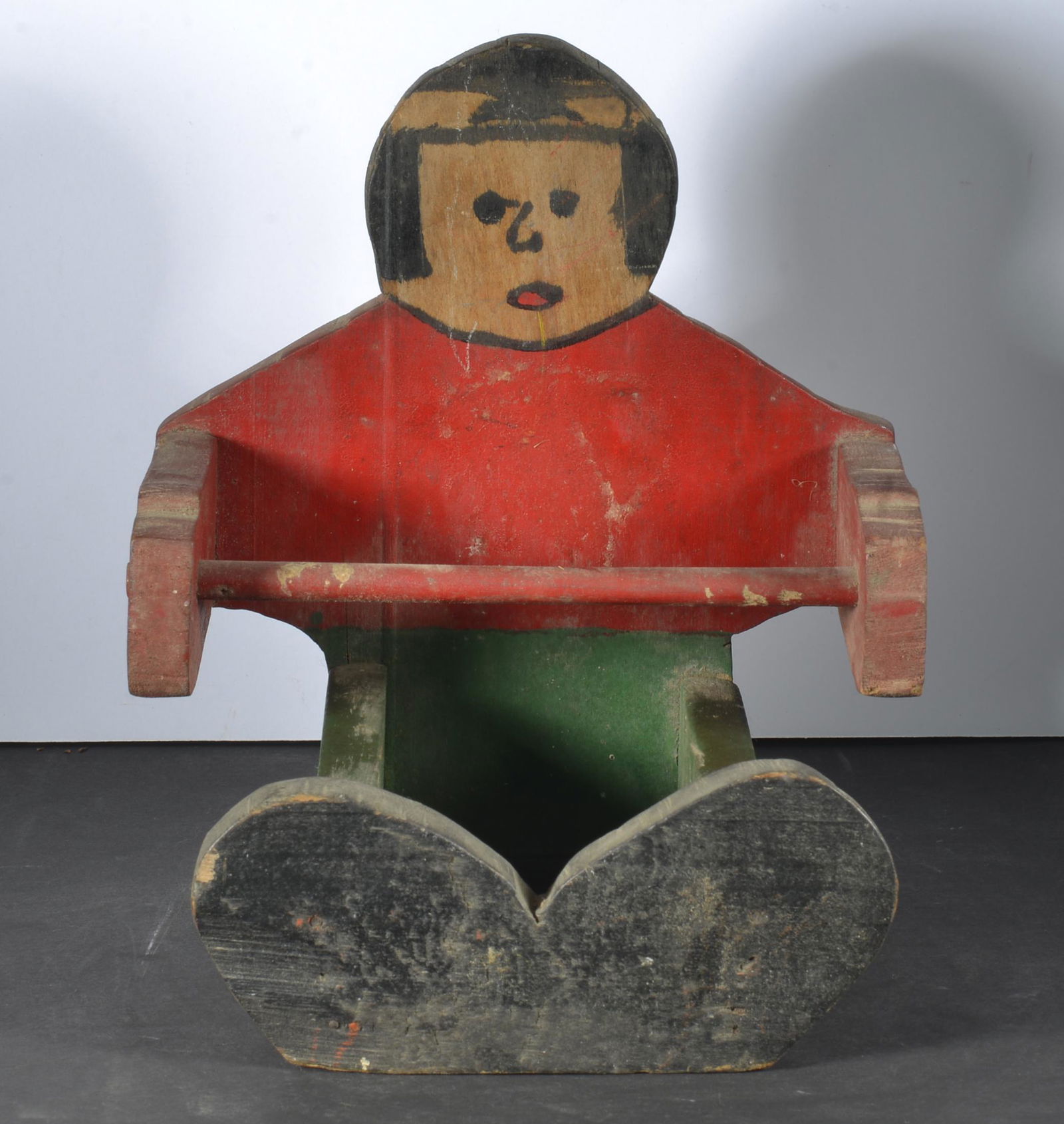 PRIMITIVE PAINTED TOILET DISPENSER: PRIMITIVE WOODEN TOILET DISPENSER PAINTED DEPICTING MAN SITTING DOWN 8" X 7" X 6"