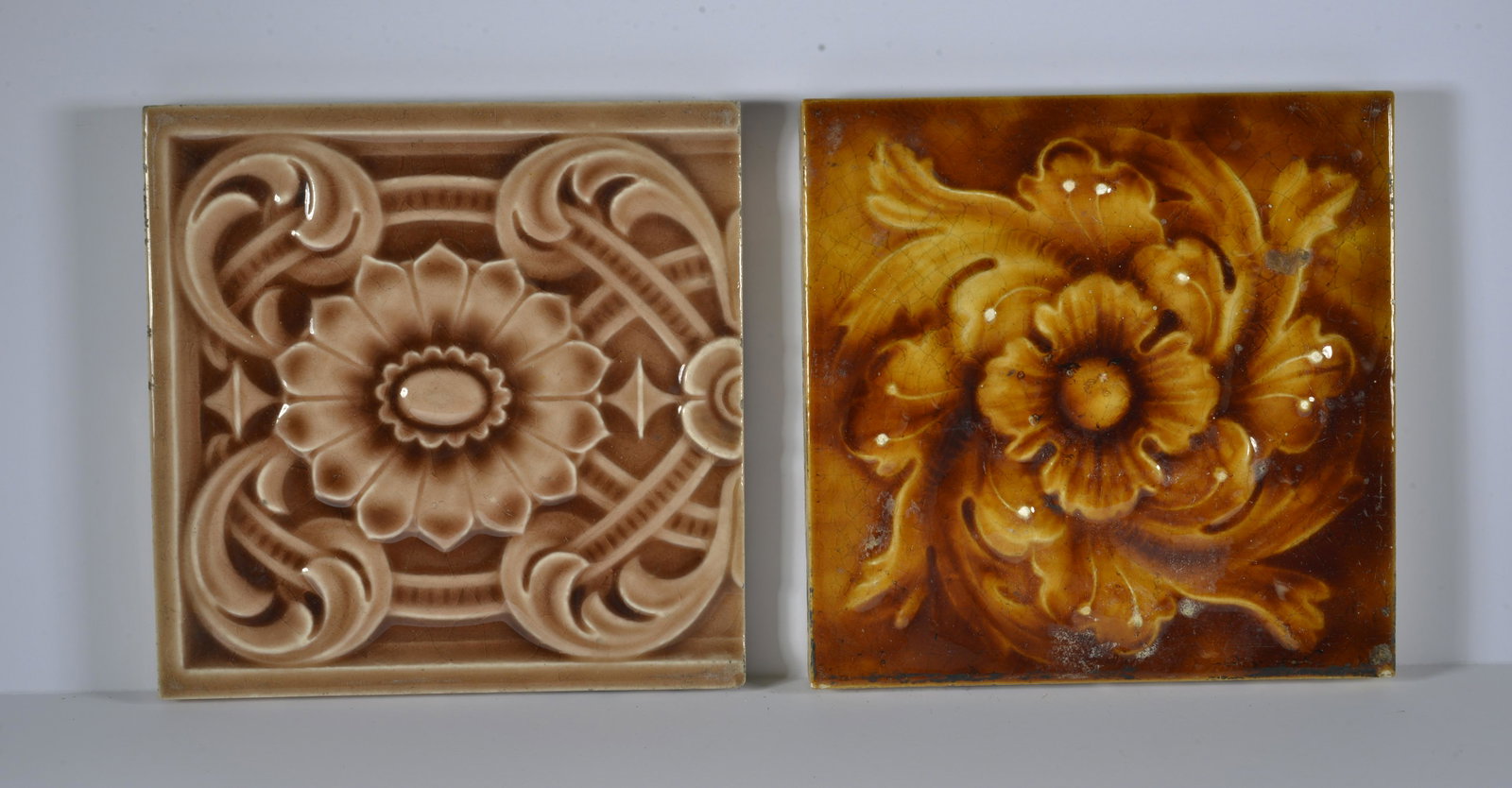 LOT OF (2) ANTIQUE TILES: LOT OF(2) MOJOLICA FLORAL MOTIF DESIGN 6" X 6"