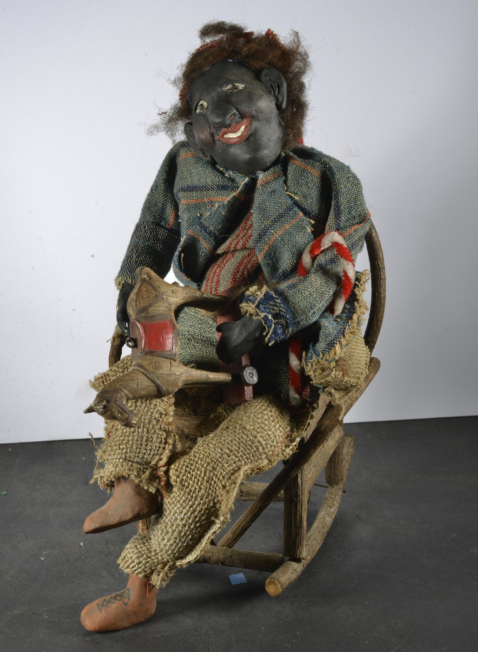 BLACK AMERICANA CLOTH DOLL IN WOODEN ROCKING CHAIR: BLACK AMERICANA CLOTH DOLL 10.5" H