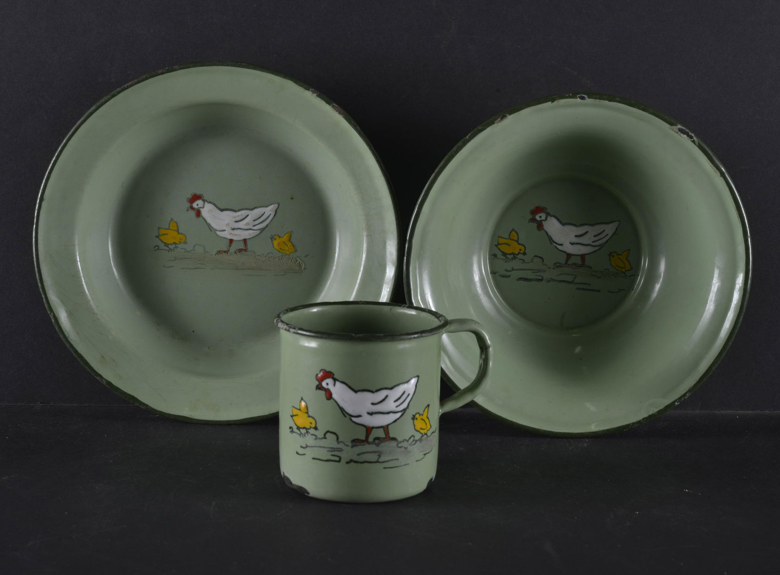 COLLECTION OF (3) MATCHING GREEN ENAMELWARE CHILDRENS SET: COLLECTION OF (3) MATCHING GREEN ENAMELWARE CHILD'S BREAKFAST SET "CHICKENS" 7" DIA
