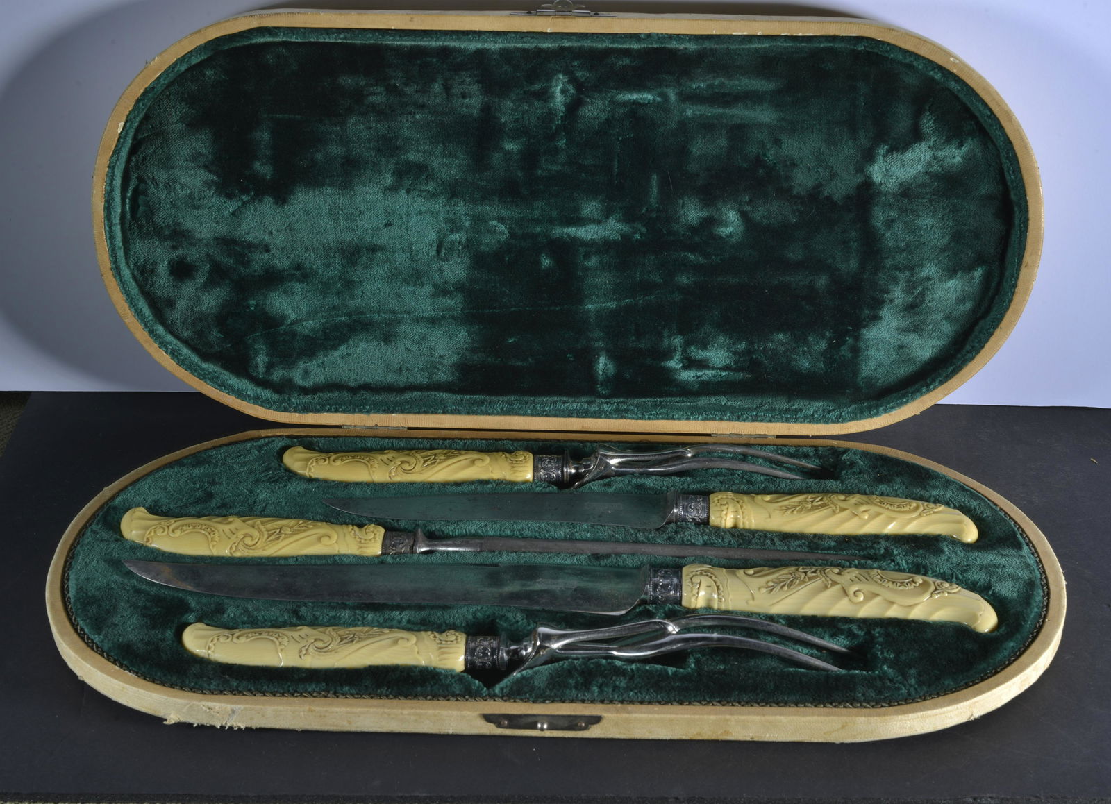 COLLECTION OF (5) MATCHING ORNATE CARVING SET IN OVAL FITTED CASE (1 of 5)
