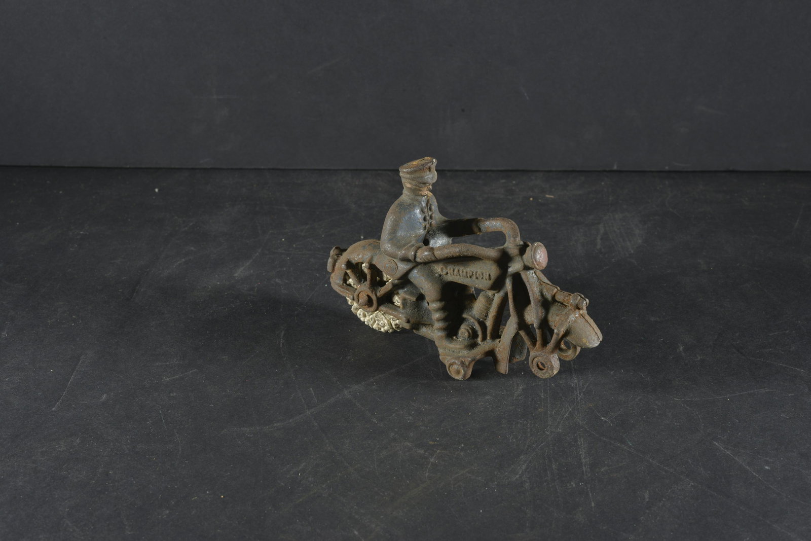 EARLY CHAMPION CAST IRON TOY MOTORCYCLE: EARLY CHAMPION CAST IRON TOY MOTORCYCLE (MISSING WHEEL) 5.5"