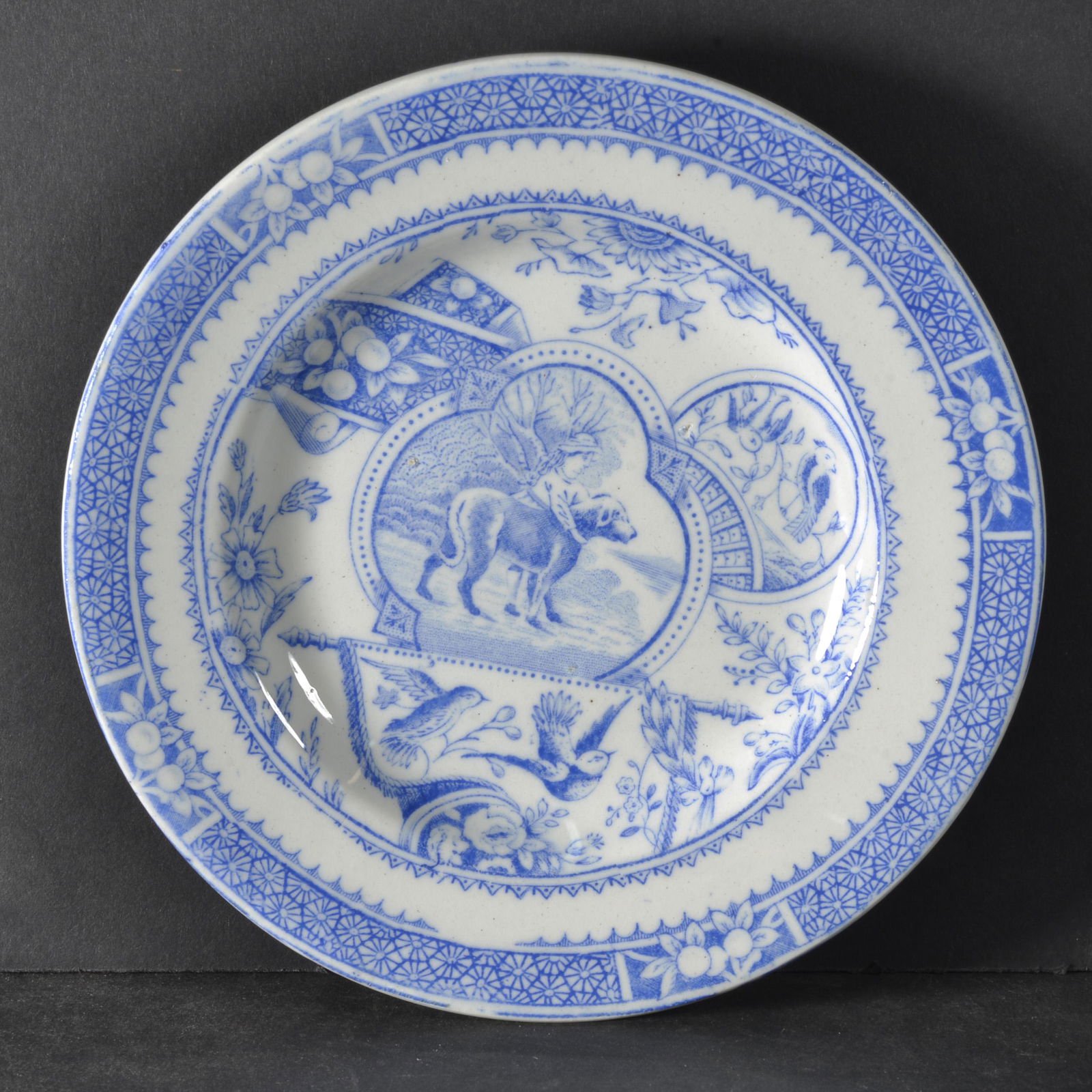 EARLY CHILD'S BLUE & WHITE TRANSFERWARE PLATE (1 of 2)