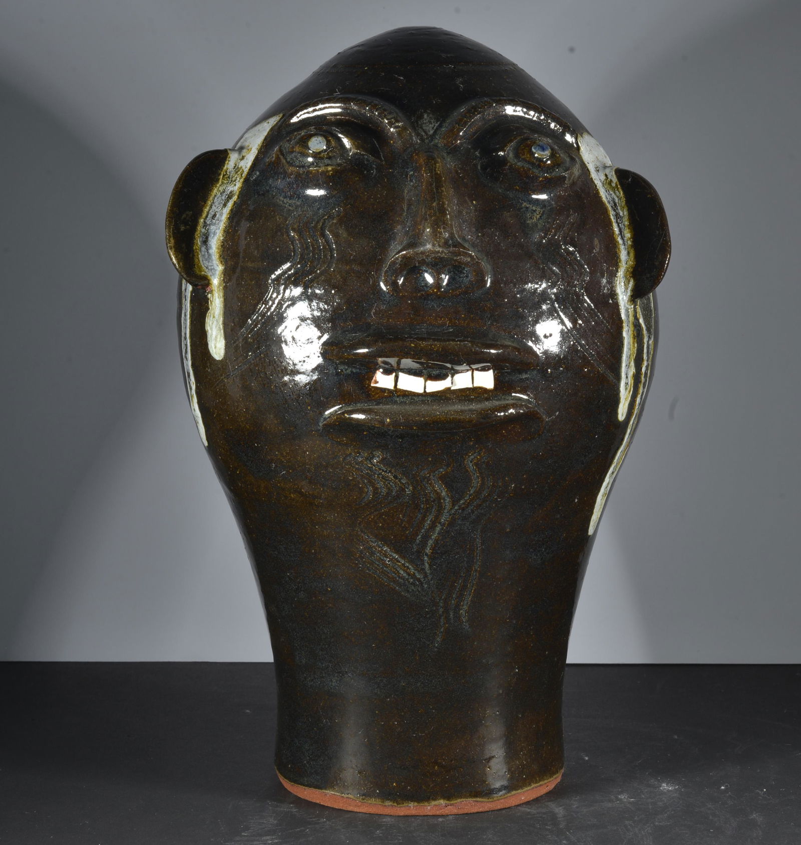 WALTER FLEMING POTTERY FACE WING STAND (1 of 5)