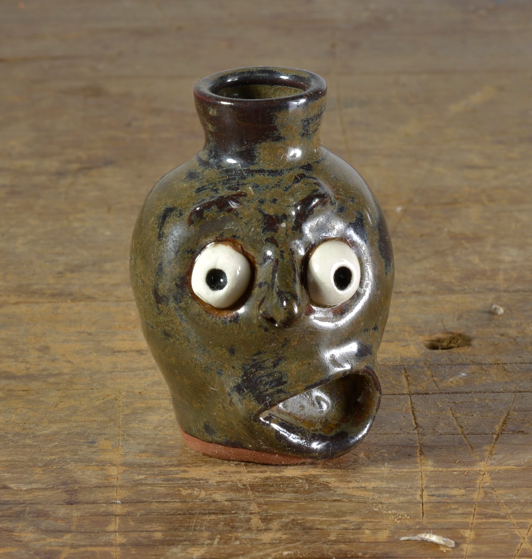 VAN HUNE MINIATURE FACE JUG (1 of 3)