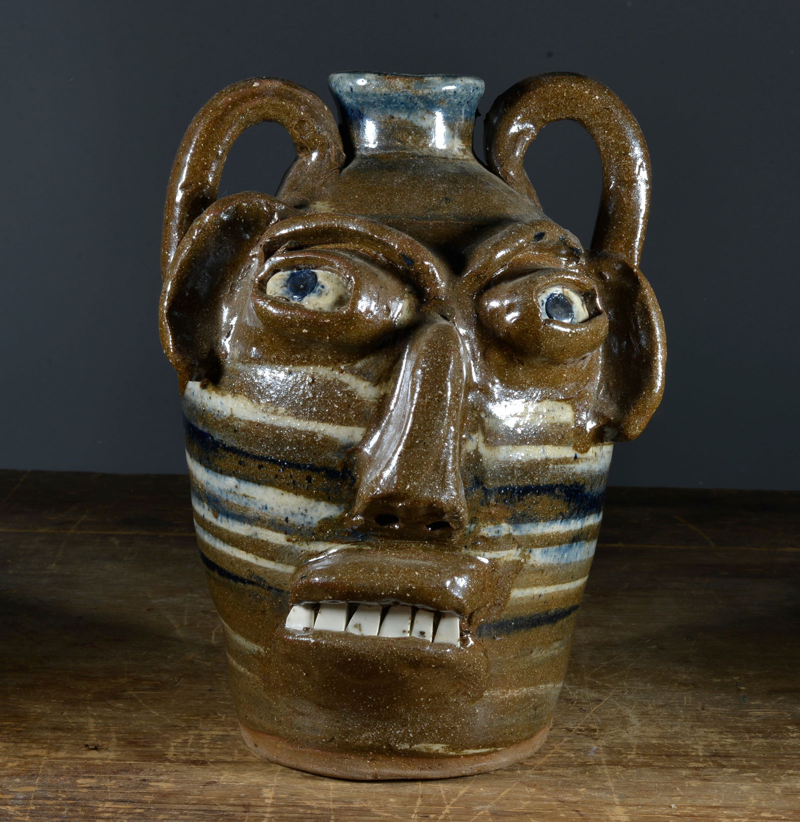BURLON CRAIG  DOUBLE HANDLE FACE JUG (1 of 3)