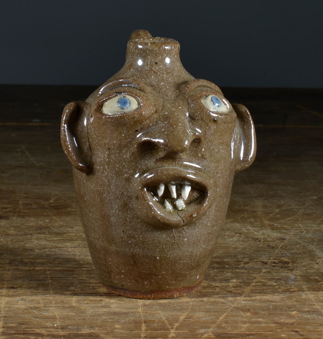 JOE REINHARDT MINIATURE FACE JUG: FACE JUG, SIGNED ON BOTTOM 4.5" H