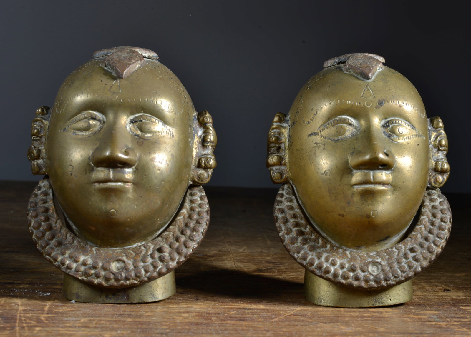 Antique Brass Heads: Brass item from an estate. 5"H