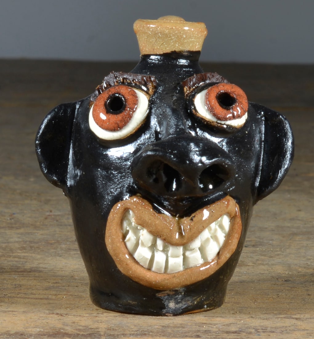 Albert Hodge Black miniature face jug (1 of 3)