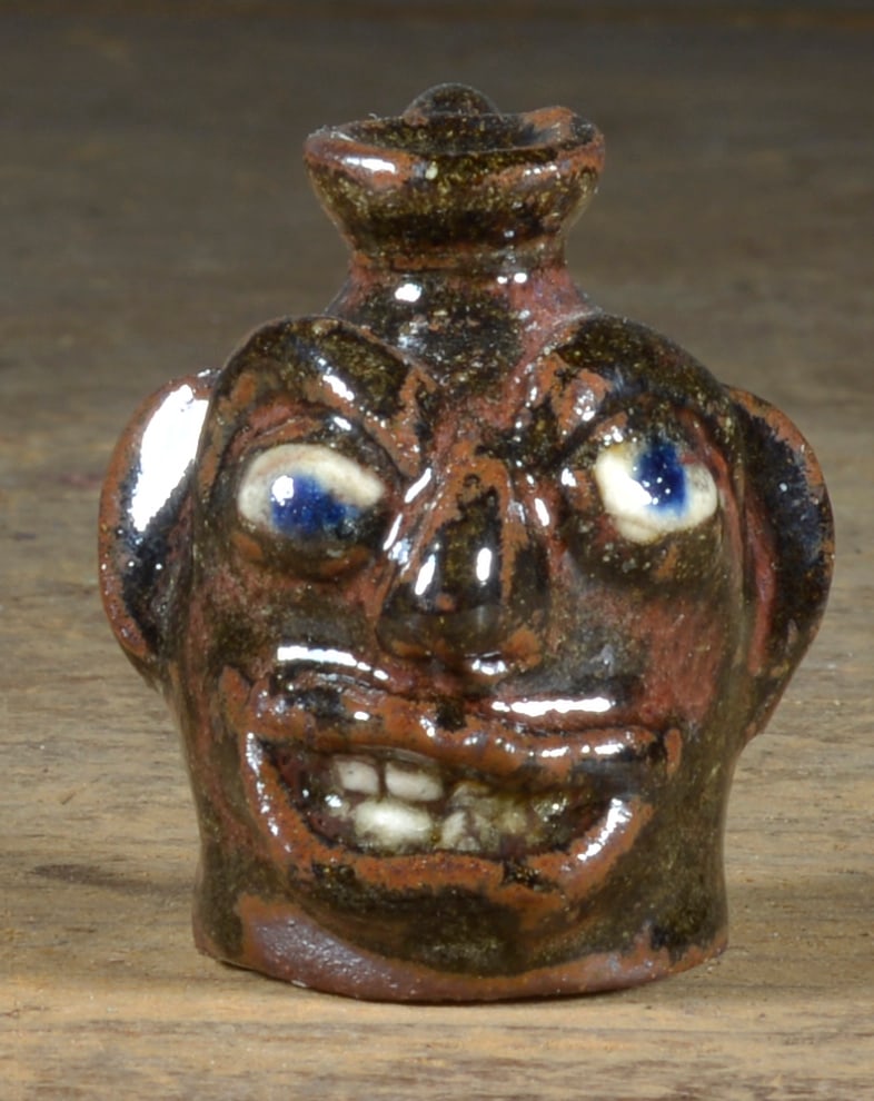 Albert Hodge Miniature Face jug (1 of 3)