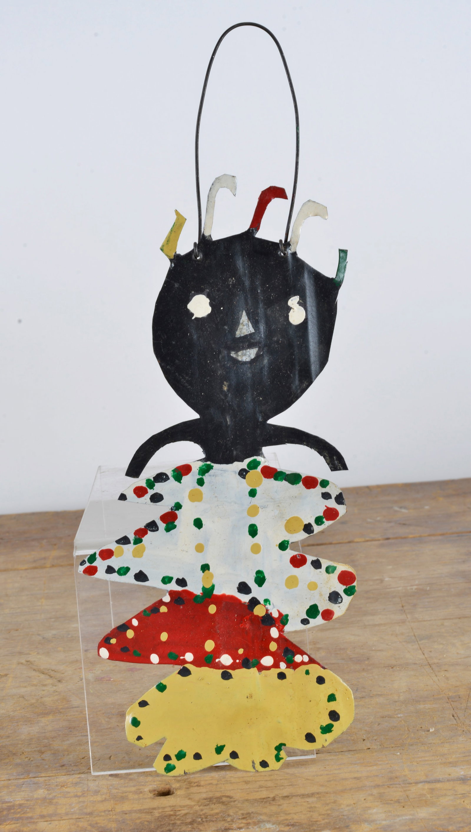 Buddy Snipes (1943 - ): 12x5 paint on cut tin metal. born Macon, Alabama. African American.