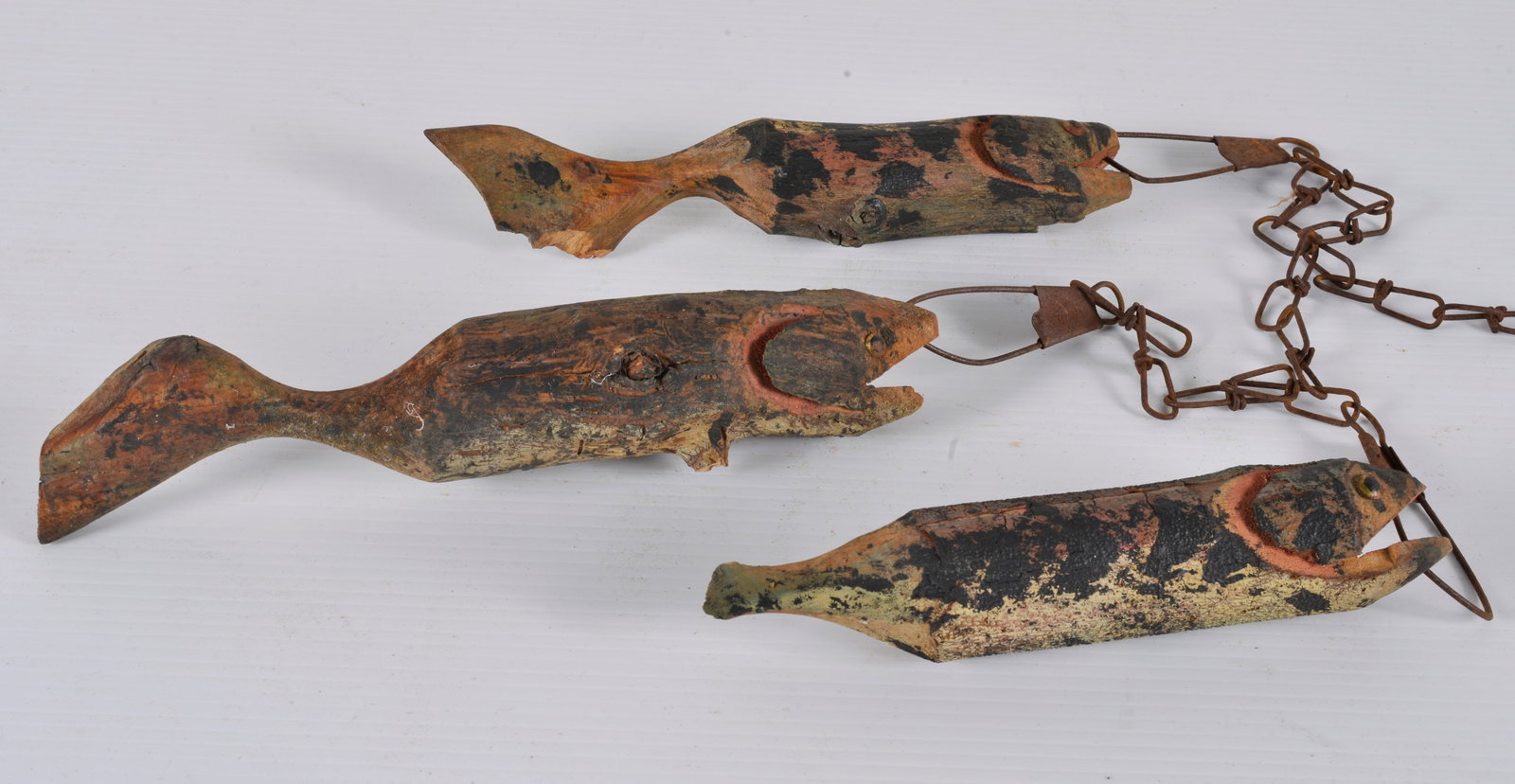 Carved and Painted Fish Decoys: hand carved and painted.LARGEST FISH IS 10"L