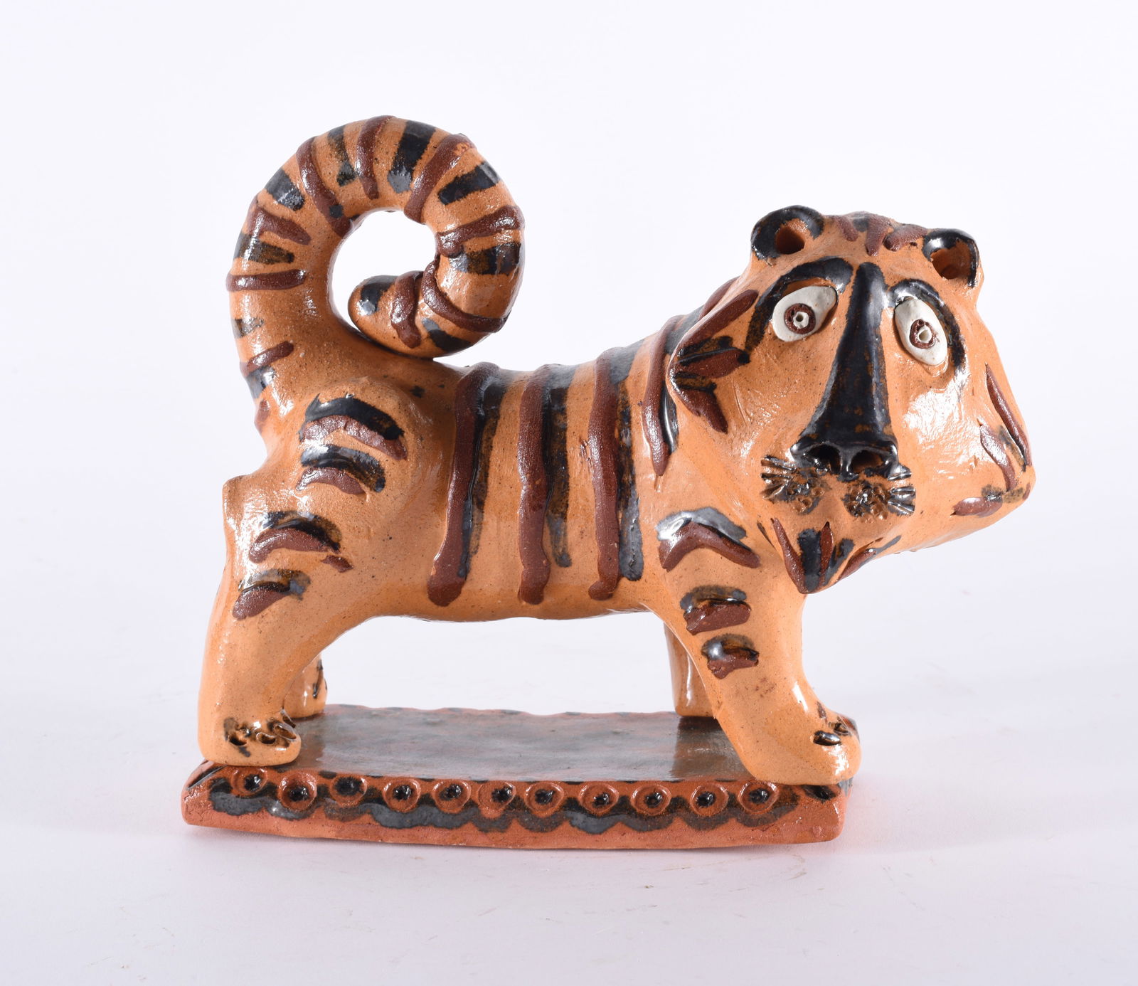 Billy Ray Hussey Tiger: folk pottery tiger on pottery base, signed on bottom. 9"x6"