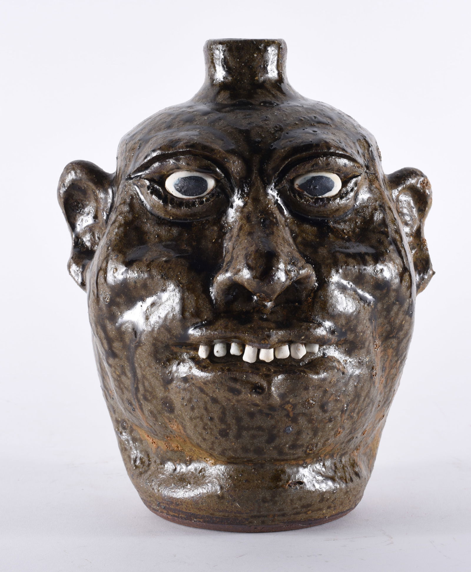 Lanier meaders Face Jug: great face jug by Lanier Meaders, mint condition no cracks chips or repairs. Clay eyes and teeth 11"