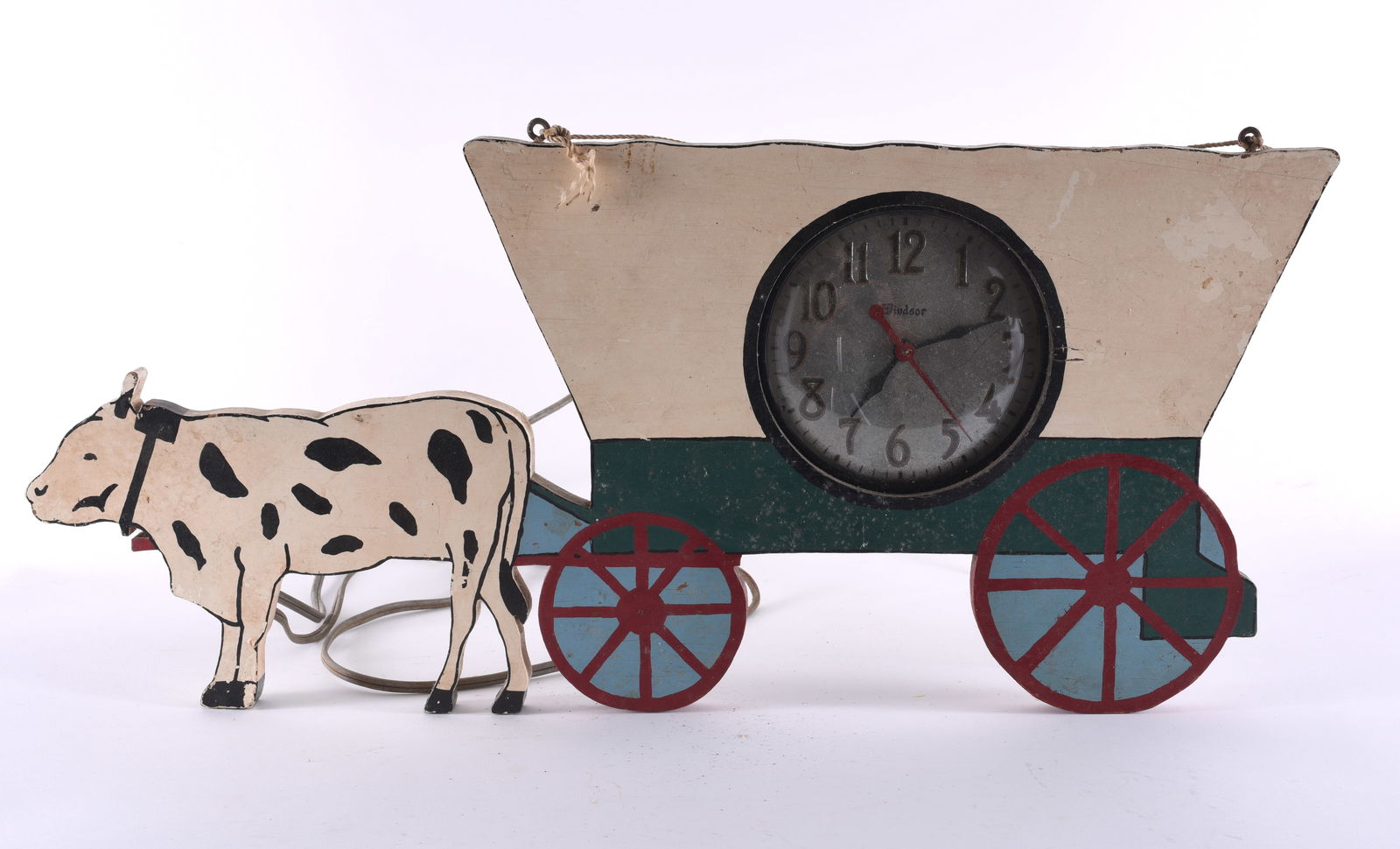 Folk Art Clock: cut wood and paint. 21" L x 10"H