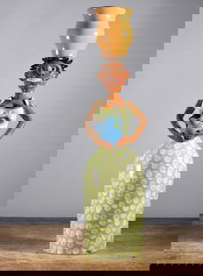 Marvin Bailey Woman Figural: 24" beautiful figural of woman holding a churn in a green pocadot dress. Also holding a miniature piece of pottery, signed on bottom.