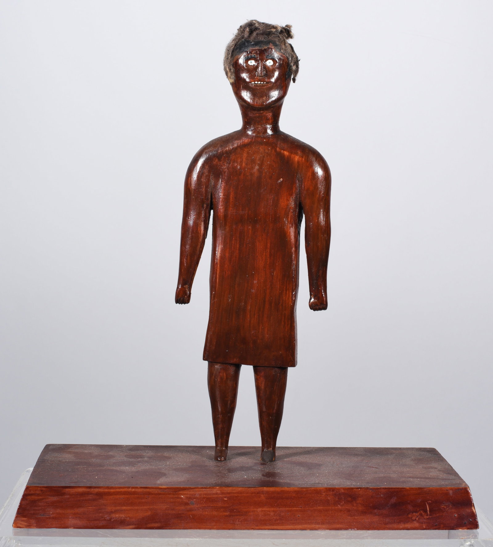 Roy Mullins African American Carved Figure: 9" x 9.5" wood carving with paint and stain mounted to base. Signed on bottom and dated 1968