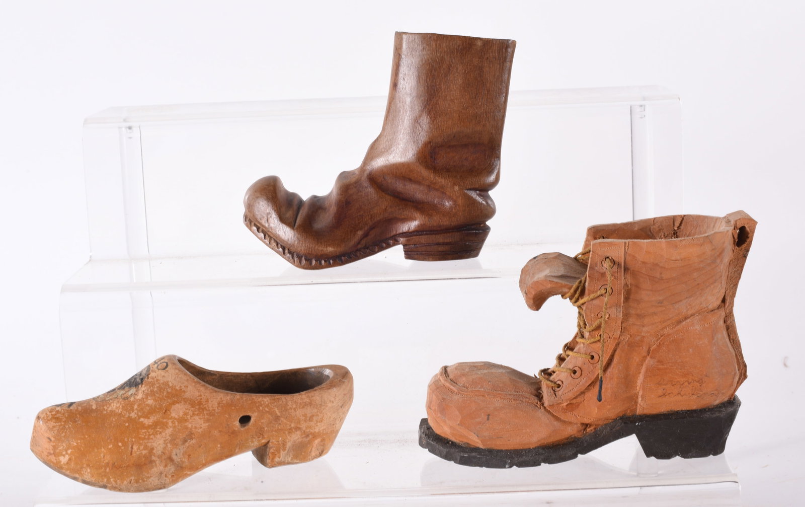 Wooden Carved Shoe Group: avg. 4" x 4"three wooden carved shoes.