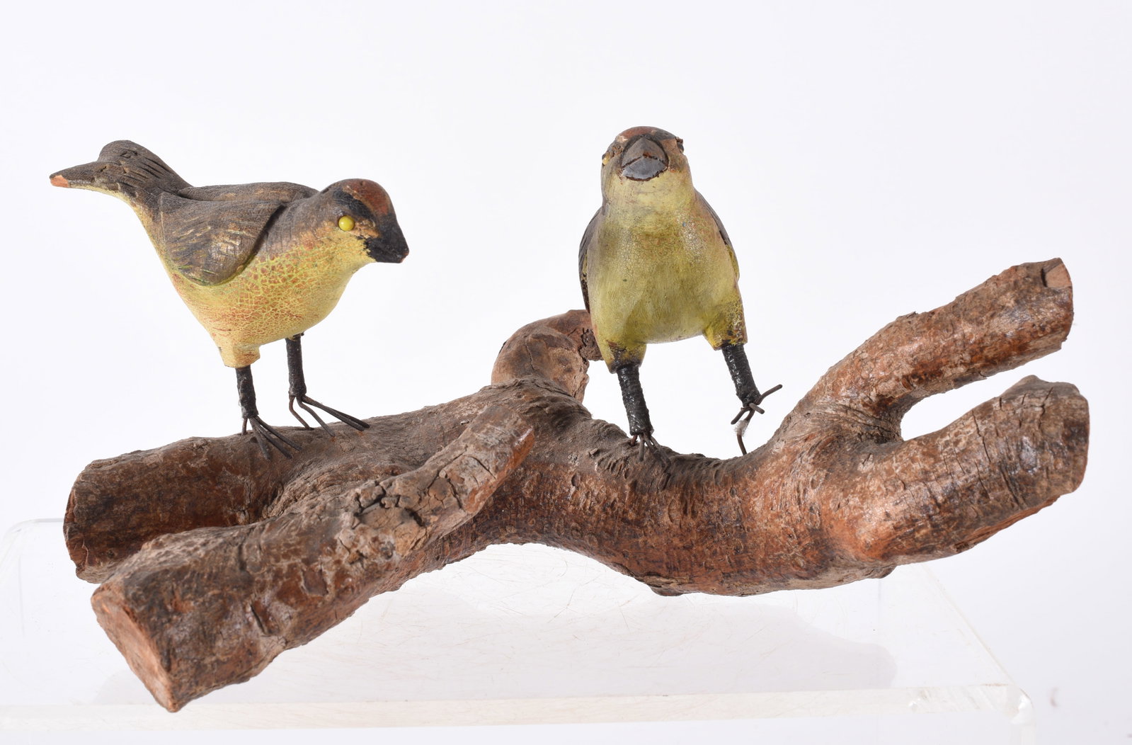 Carved Wooden Birds: 9" x 3" carved wood and paint mounted to branch